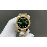Sunday Calendar series women's watch, green dial, gold bezel, 36mm, with diamond-set gold President-style bracelet.